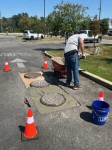 Concrete Repair Near Manhole Covers in Mobile